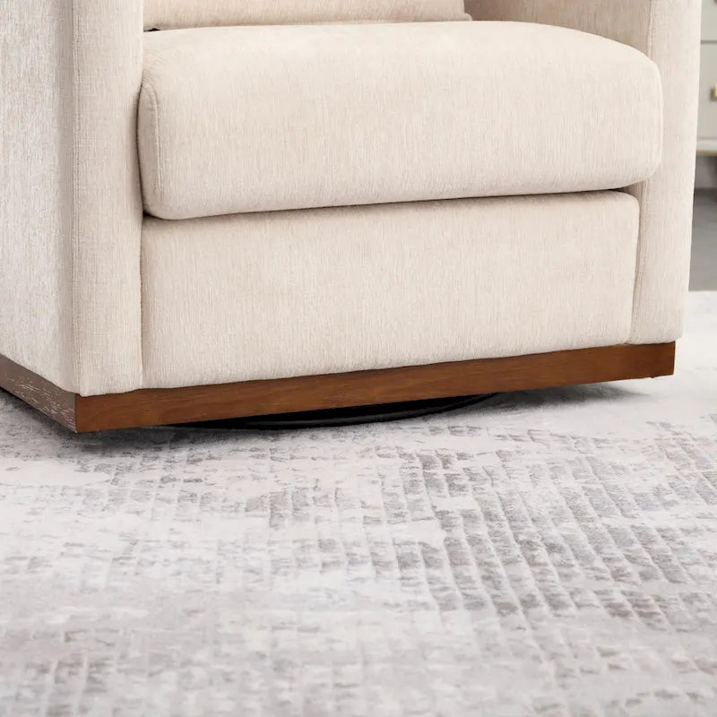 Le fauteuil baquet pivotant Chenille est doté d'une base métallique robuste et d'un design ergonomique.