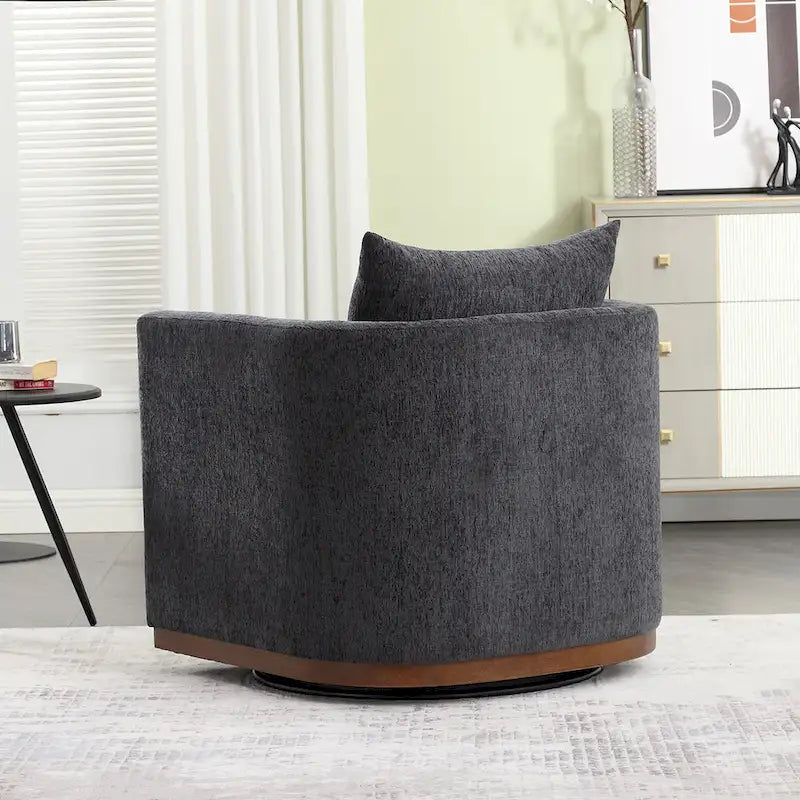 Le fauteuil baquet pivotant Chenille est doté d'une base métallique robuste et d'un design ergonomique.