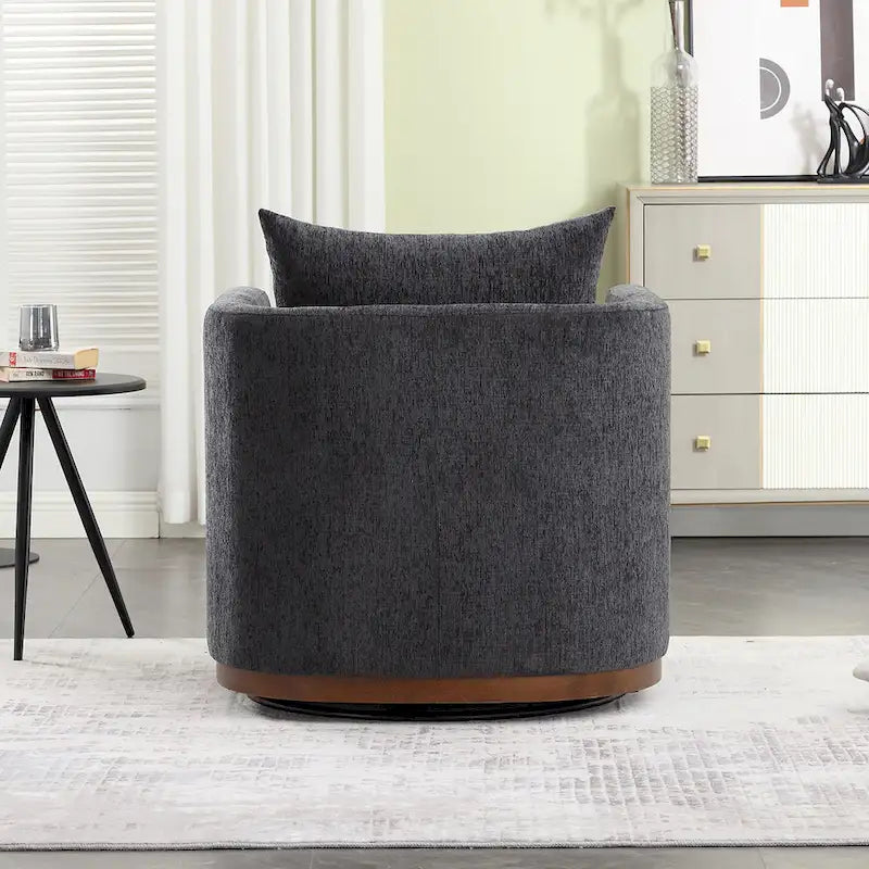 Le fauteuil baquet pivotant Chenille est doté d'une base métallique robuste et d'un design ergonomique.