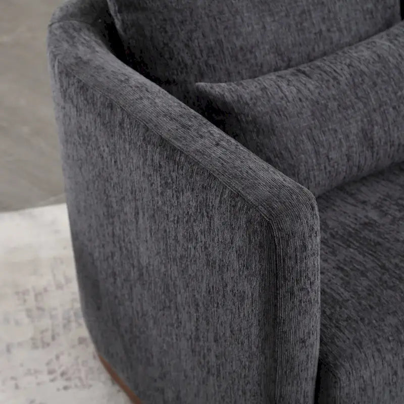Le fauteuil baquet pivotant Chenille est doté d'une base métallique robuste et d'un design ergonomique.