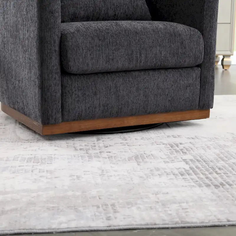 Le fauteuil baquet pivotant Chenille est doté d'une base métallique robuste et d'un design ergonomique.